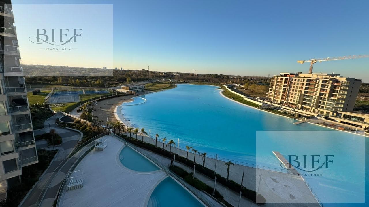 Departamento 2 ambientes en Remeros Beach · 54 m² con balcón, vista al golf y cochera — imagen 1
